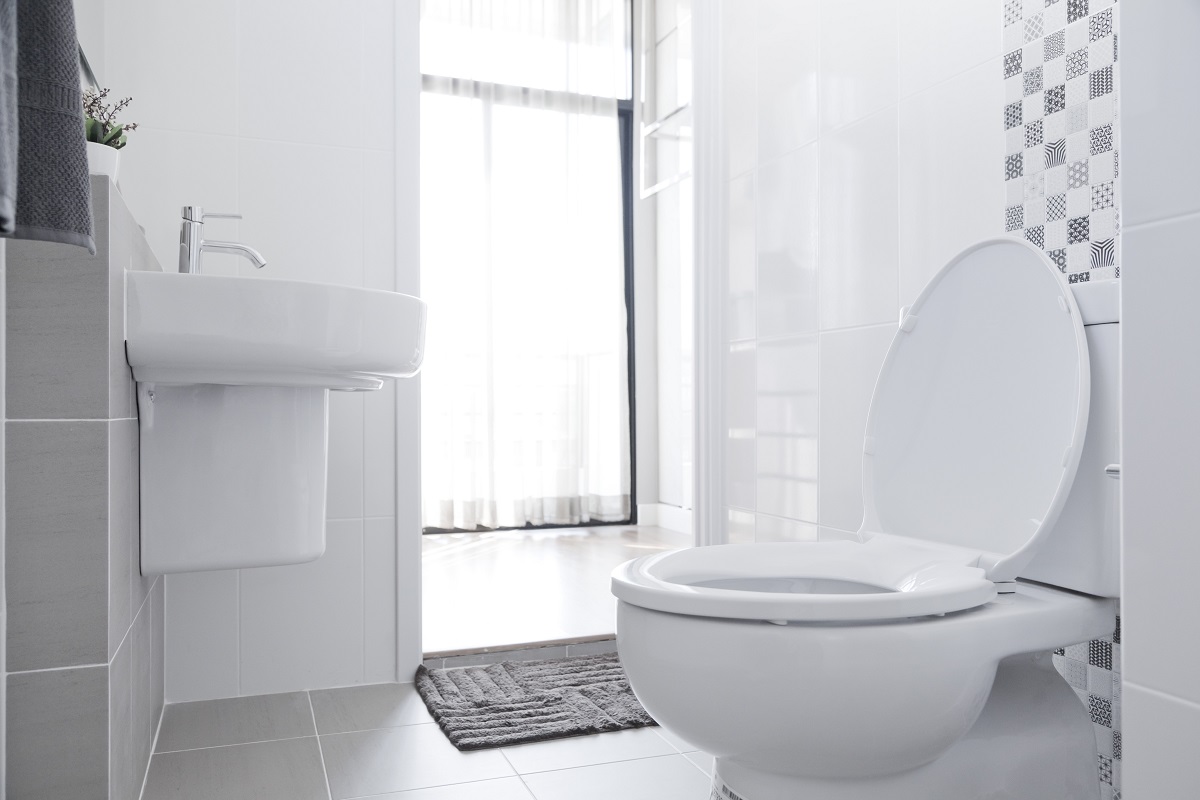 Bathroom with white toilet and sink