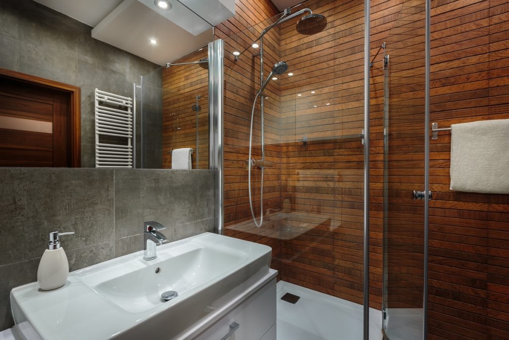 Bathroom with wooden shower walls