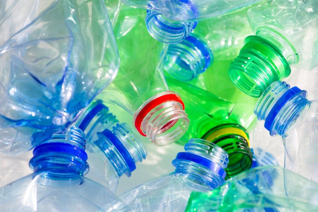 Plastic bottles with different cap colours