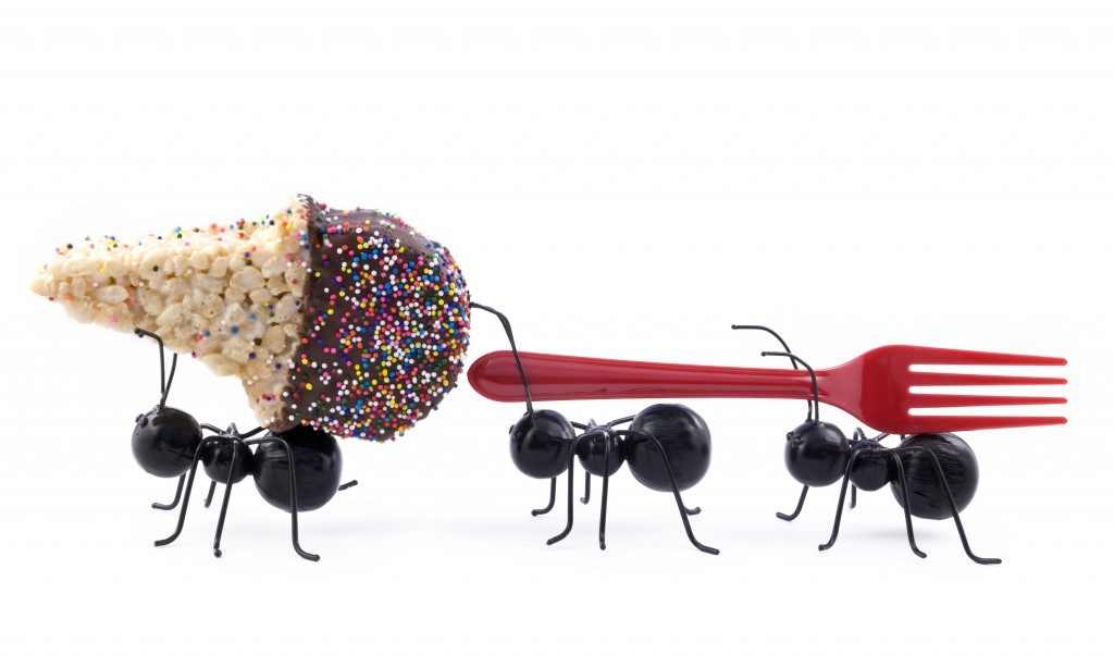 Ants carrying ice cream and fork