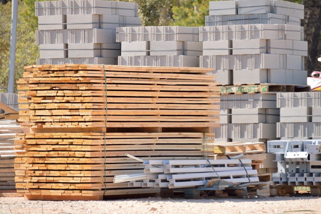 Construction materials stacked outdoors