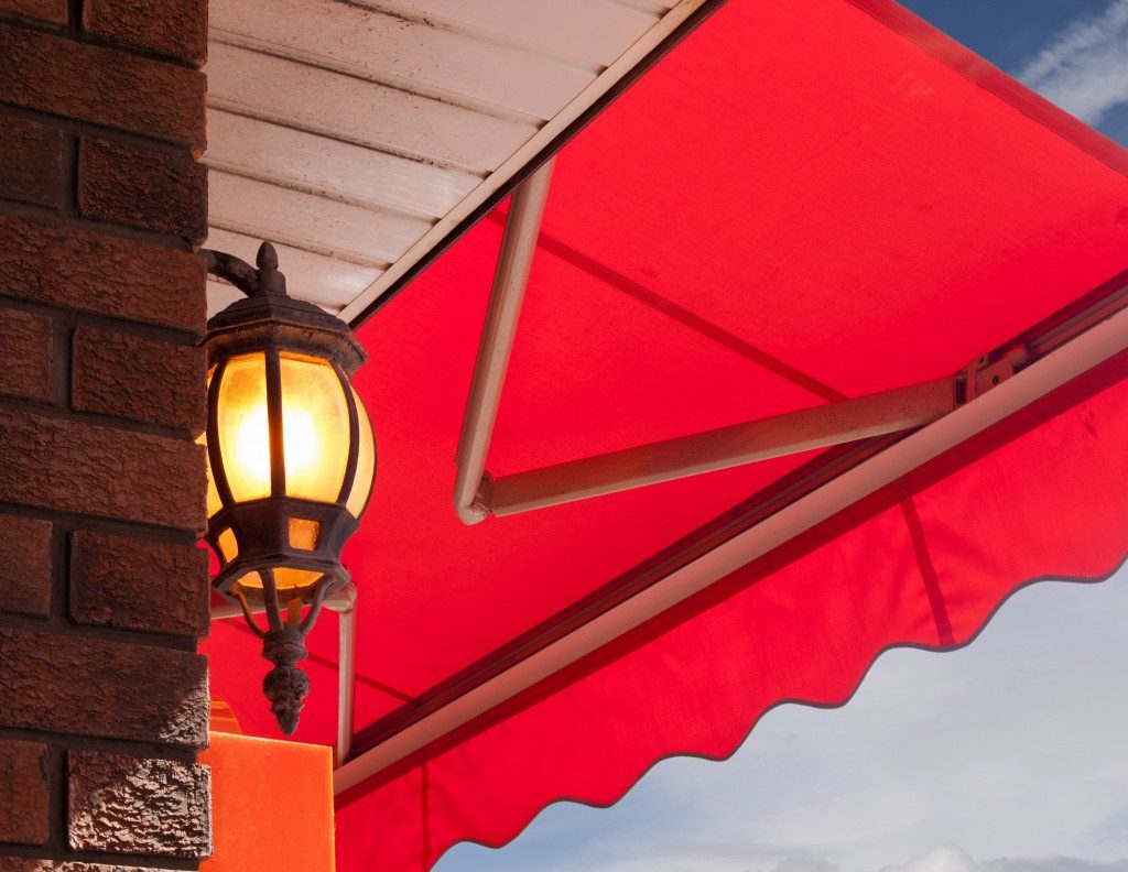 Red awning above light