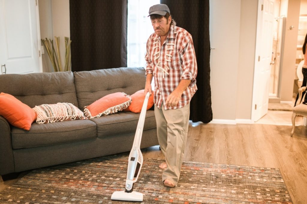 man using a vacuum