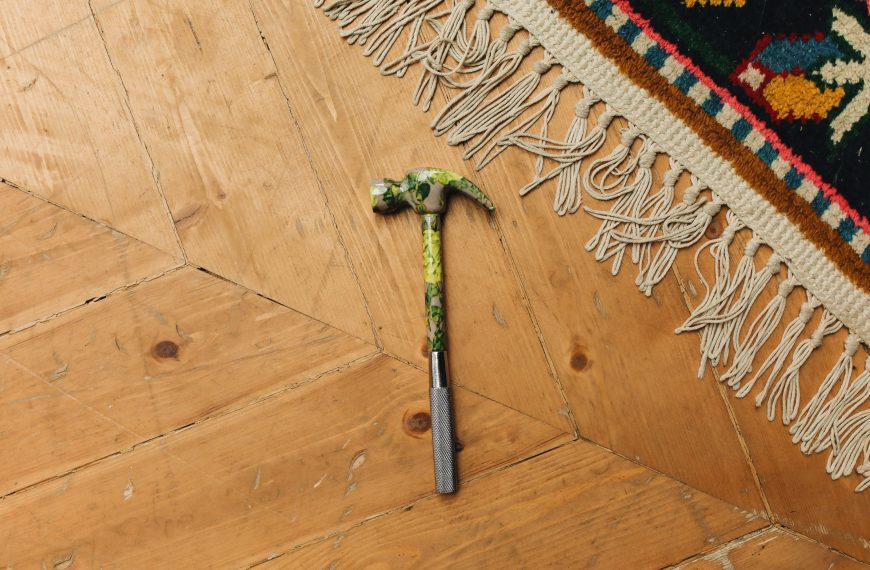 hammer and rug on hardwood flooring